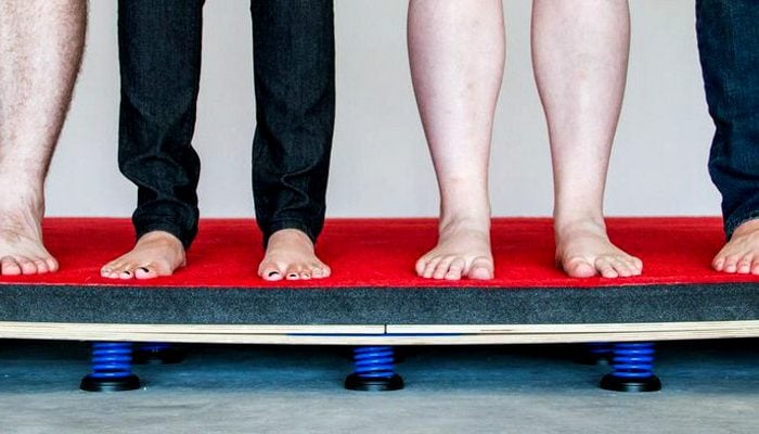 A spring board being tested at Hot Lava Obstacle Course