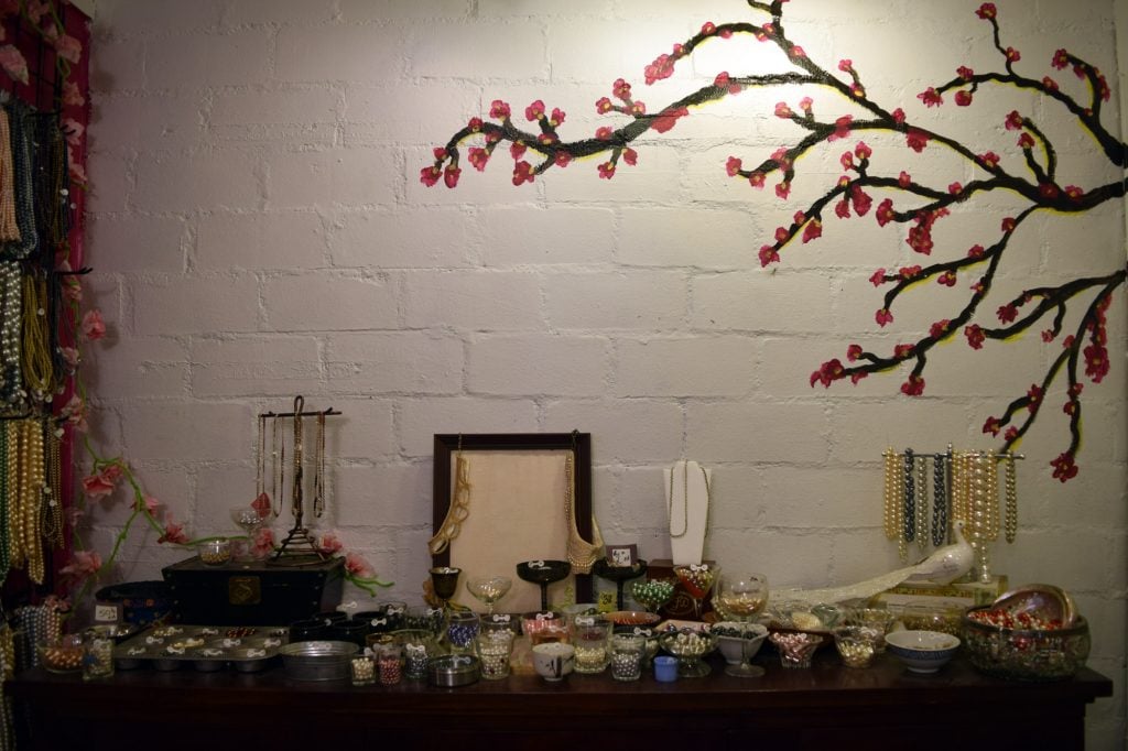 Table at Bead It with Tree Painting