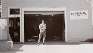 Dane Krager in front of Dane's Body Shop