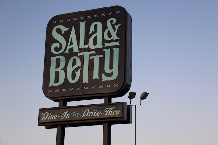 Sala and Betty Austin Sign