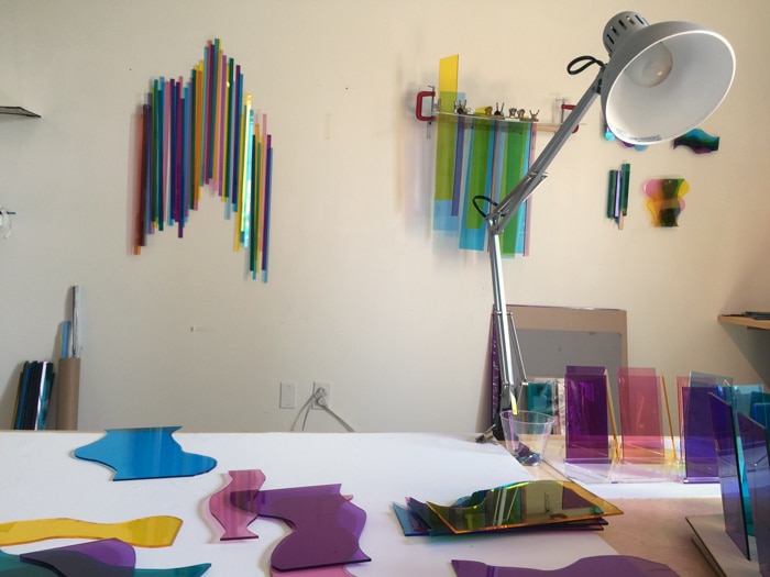 Melissa Borrell work table and studio wall of experimentation