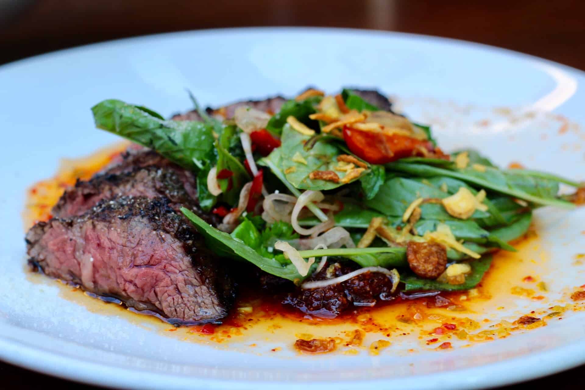 Tiger Cry with char-grilled hanger steak at Sway