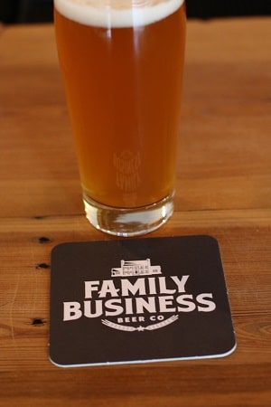 Family Business Brewing Company Glass and Logo