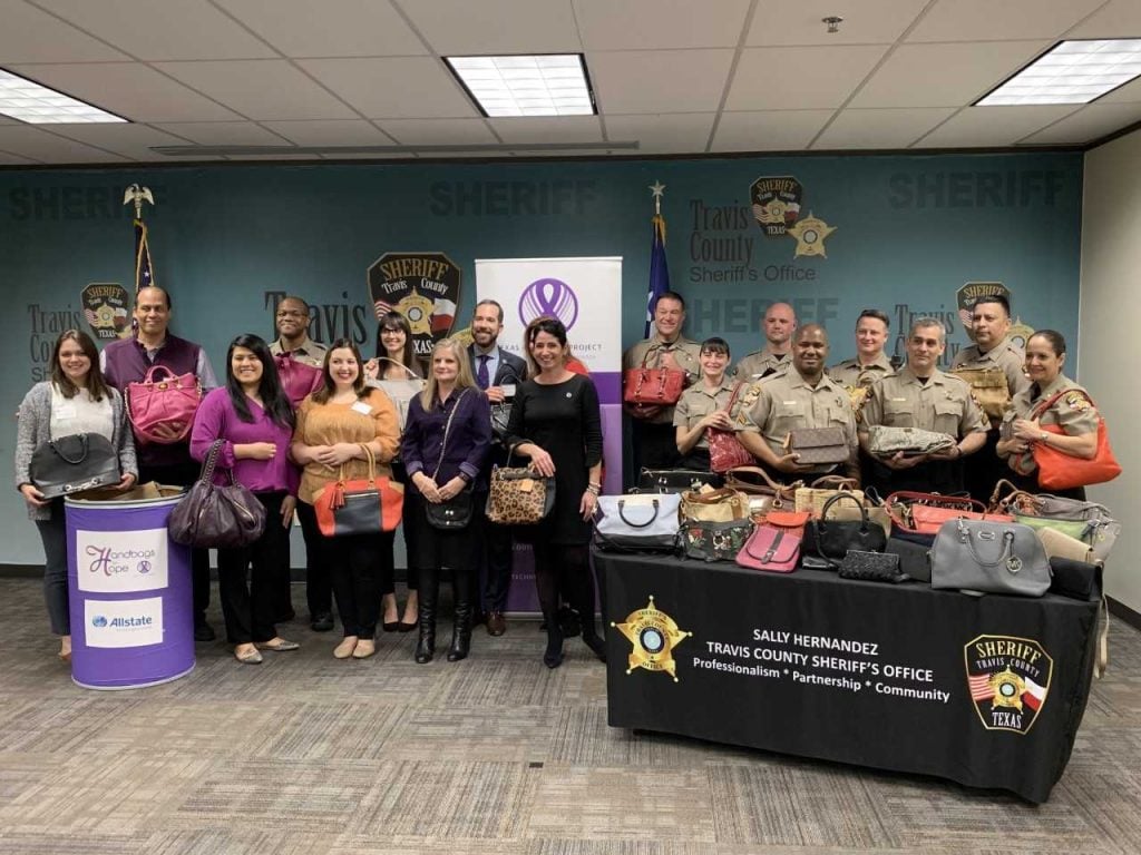 Texas Advocacy Project and Travis County Sheriff's office Handbags for Hope